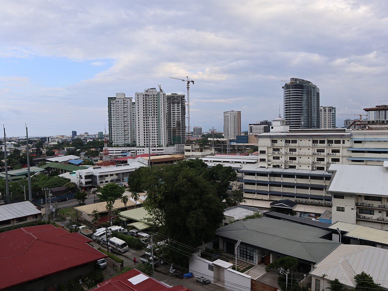 Mid-rise buildings and construction cranes along Bajada in Davao City