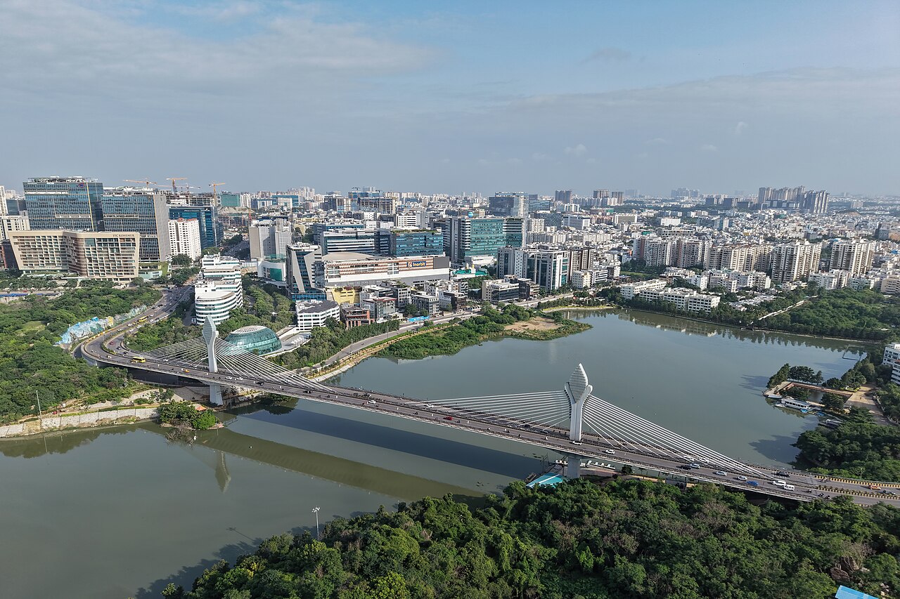 Aerial view of HITEC City in Hyderabad, with Durgam Cheruvu in the foreground and office towers beyond