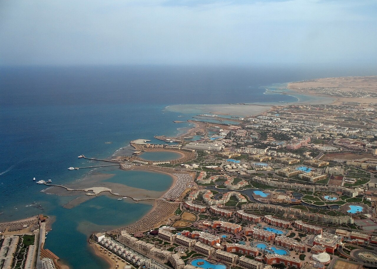 Beachfront hotel towers along the Red Sea at Hurghada, with the water in the foreground